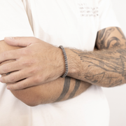 BRACCIALE CORDA CON ELEMENTI TONDI PUNTINATI