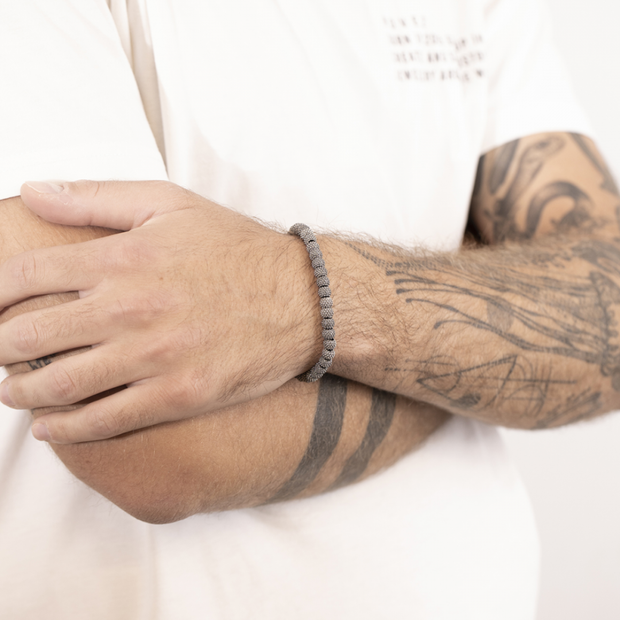 BRACCIALE CORDA CON ELEMENTI TONDI PUNTINATI